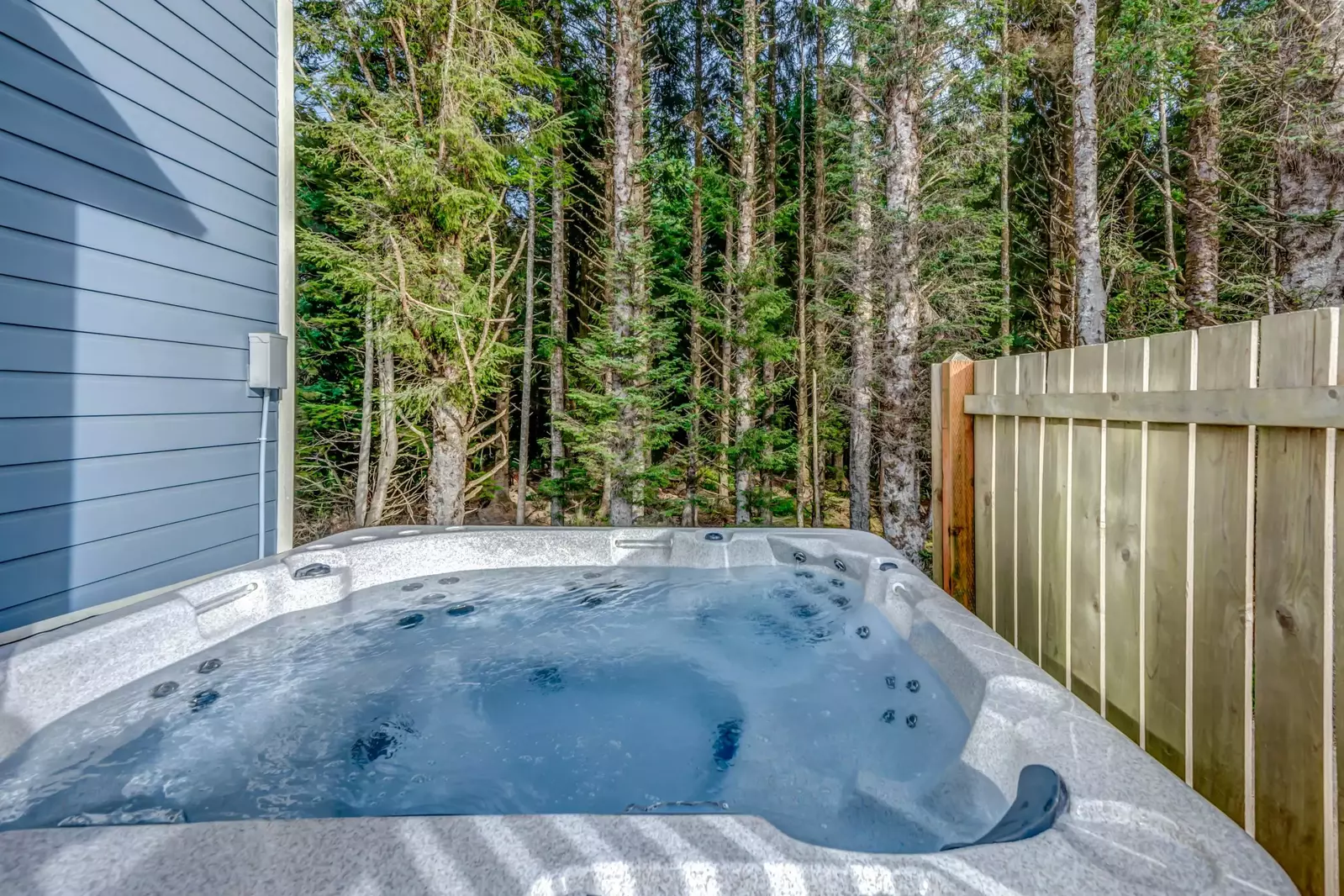 The gap between the deck and the hot tub has been repaired — there is no longer any separation.