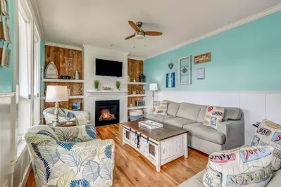 Watch you favorite movies, shows, and sports on this smart tv while relaxing in front of a cozy fire.