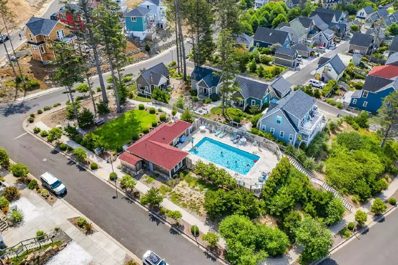 Olivia Beach is a cozy neighborhood with a community park, a volleyball court, a seasonal pool, a playground, and easy beach access.