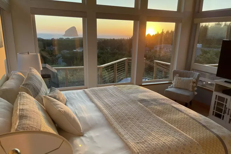 One of the best views is from this comfortable bed. Wake up to the stunning vista of Pacific City's iconic sea stack.