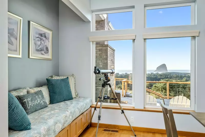 Get a closer look at Chief Kiwanda Rock with the telescope. This sea stack is 100 feet taller than Cannon City's Haystack Rock.