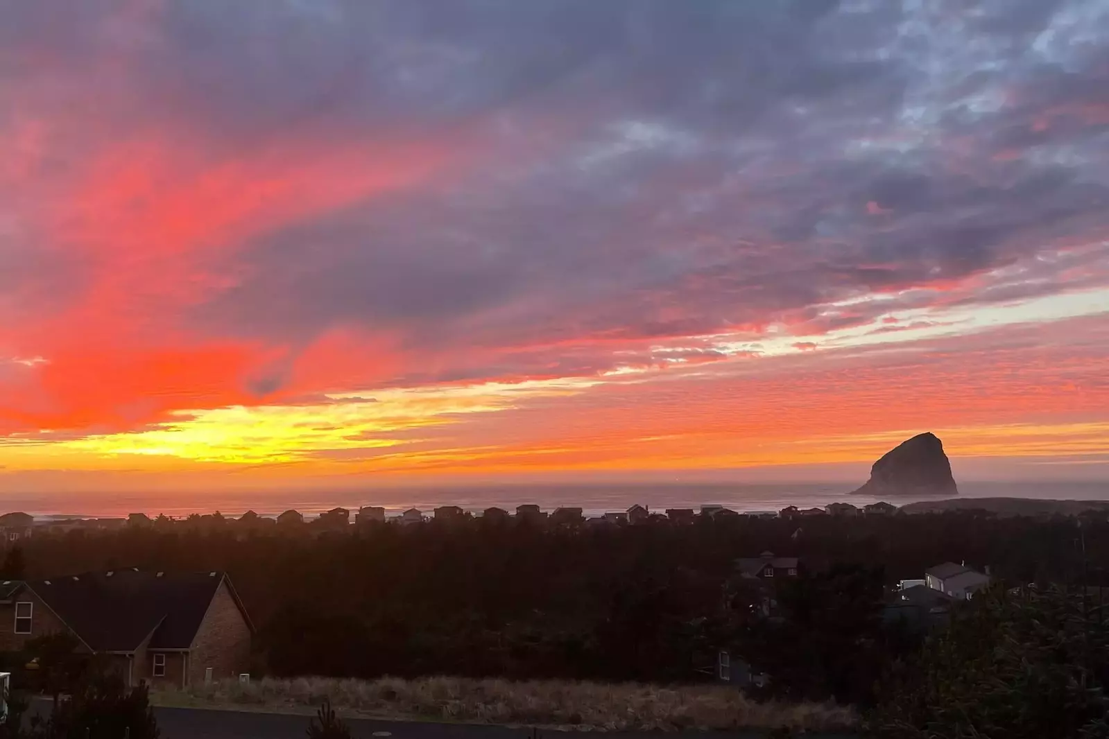 Pacific City has many must visit spots including the beach, Cape Kiwanda, the sand dune, and the beachfront Pelican Brewery.