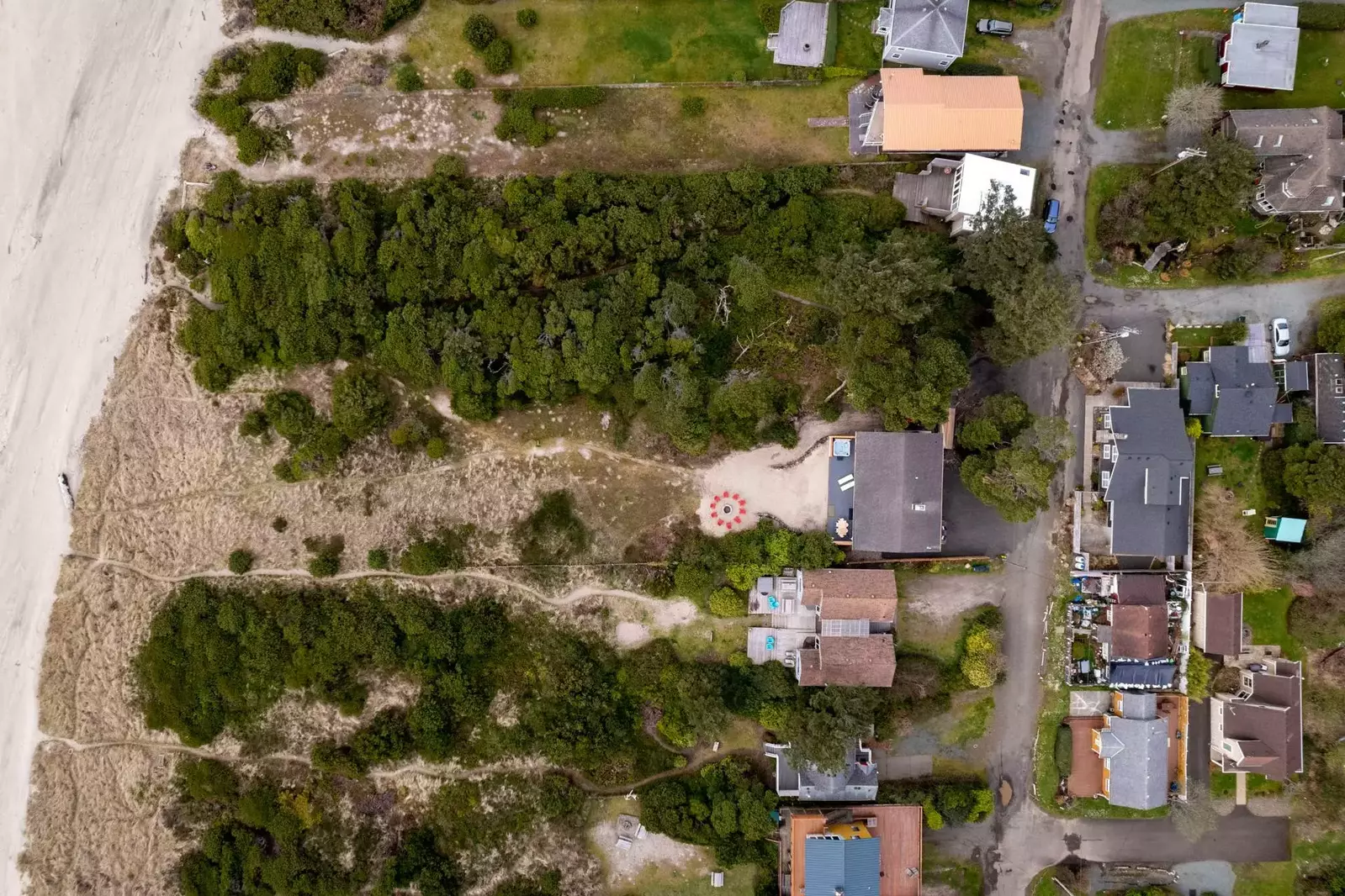 Just steps away from the home, the beach awaits.