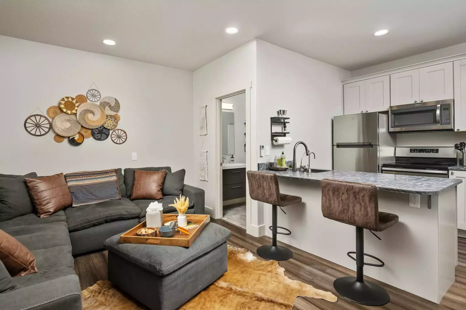 Bedroom 6 is a private suite above the garage and includes a king bed, kitchen, living area and bathroom for those looking for quiet or privacy.