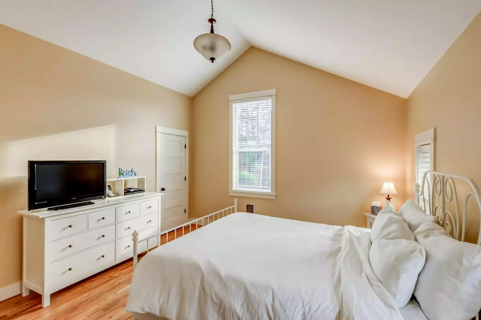 Watch some tv as you recharge in this comfy bed.