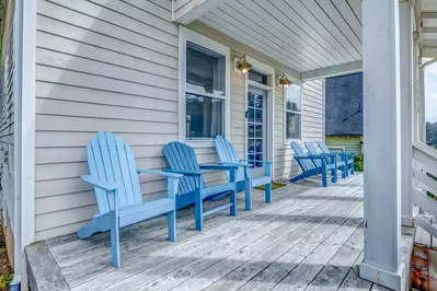 Enjoy relaxing outside on the porch in every season.