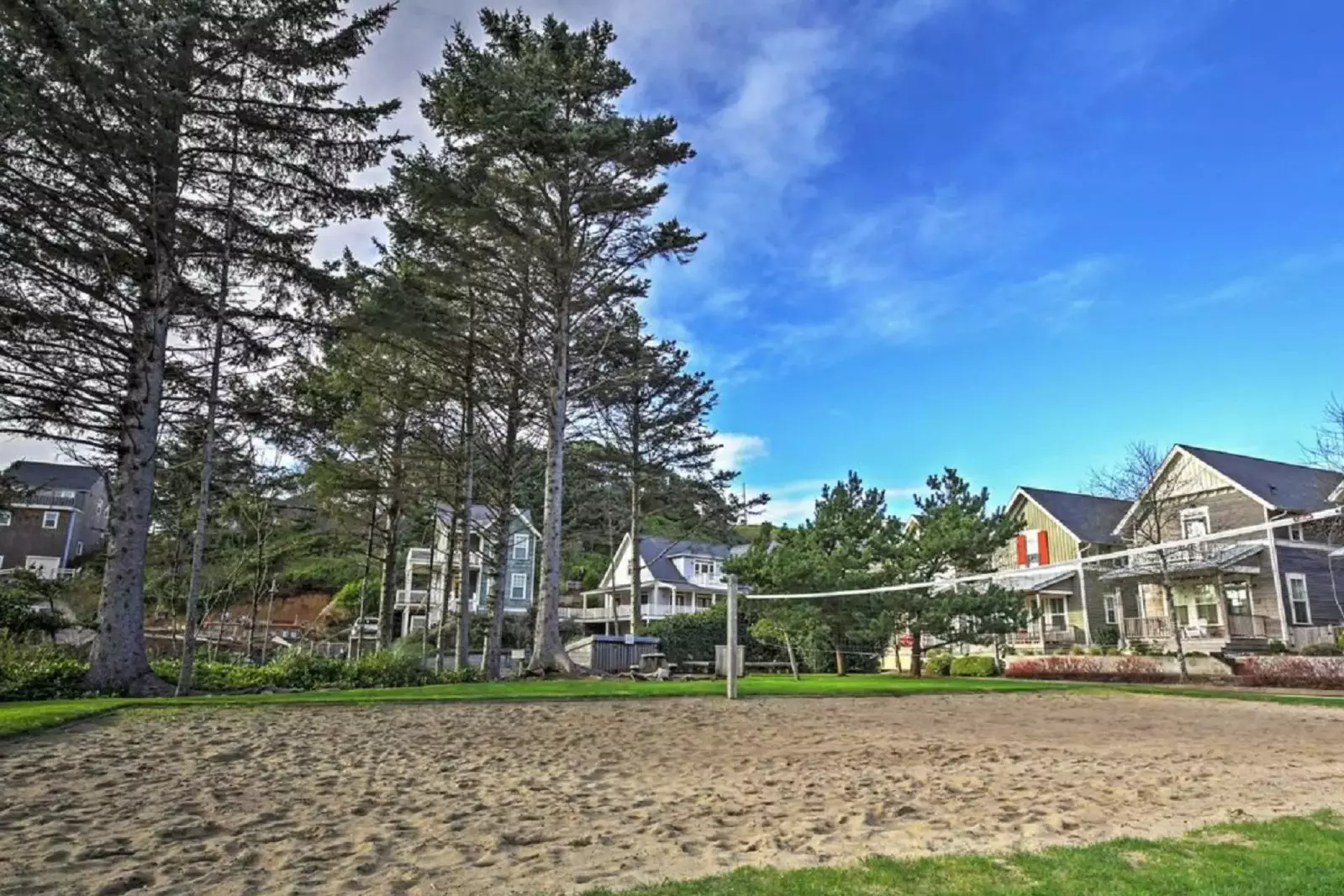 Olivia Beach is a cozy neighborhood with a community park, a volleyball court,  a playground, and easy beach access.