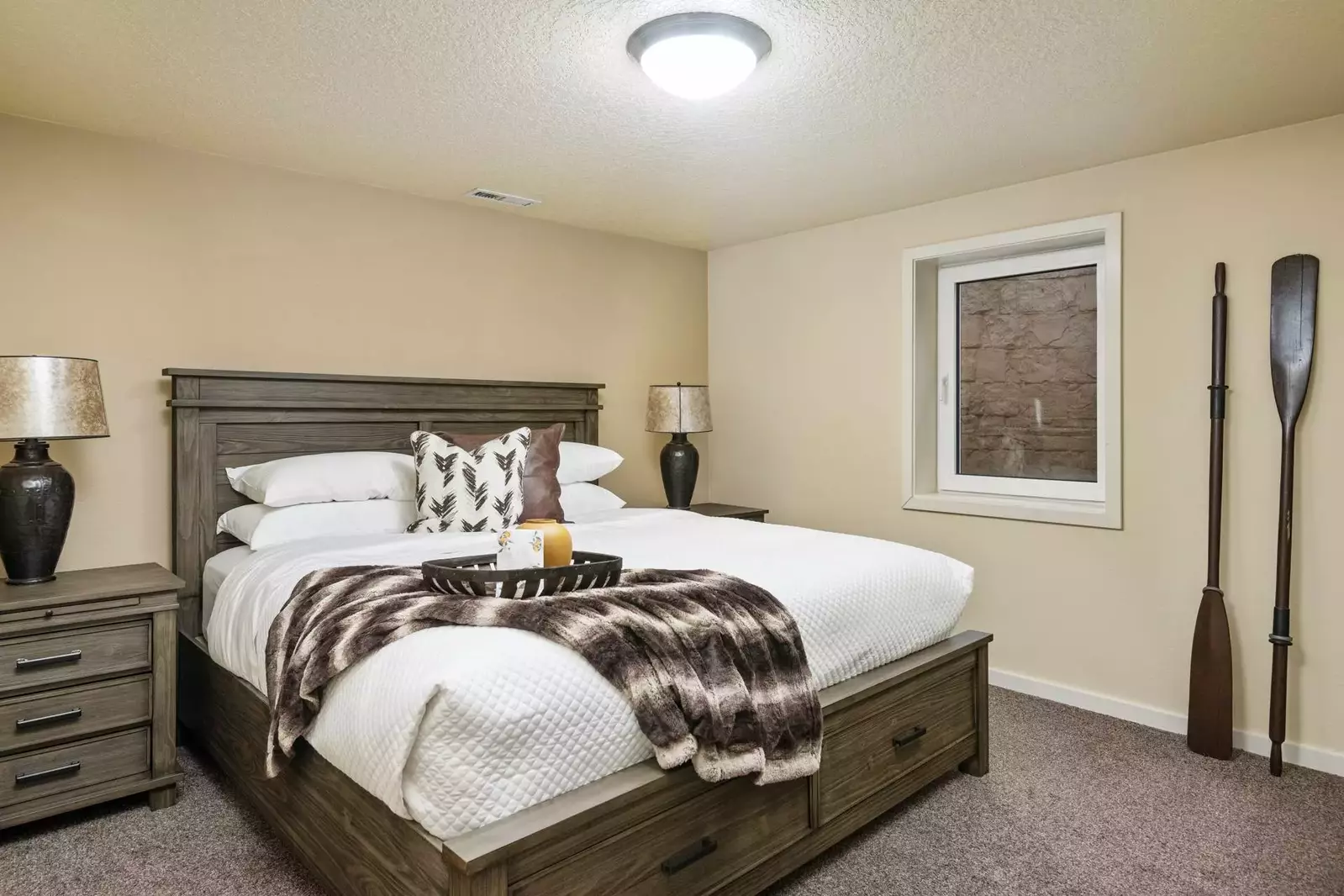 One of two spacious downstairs bedrooms with king bed.
