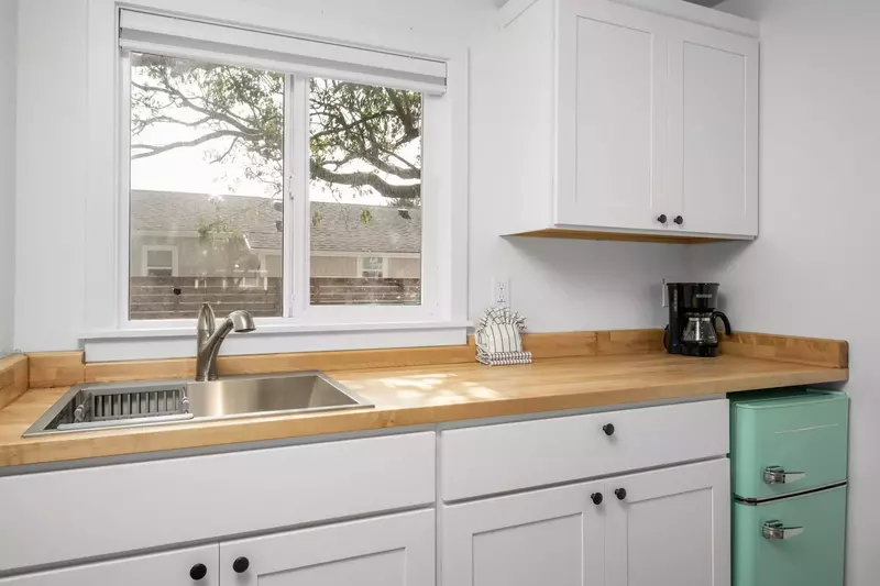 Enjoy a nice meal in the kitchenette area equipped with a mini-fridge, coffee maker, and microwave.