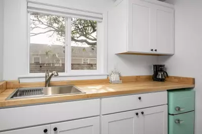 Enjoy a nice meal in the kitchenette area equipped with a mini-fridge, coffee maker, and microwave.