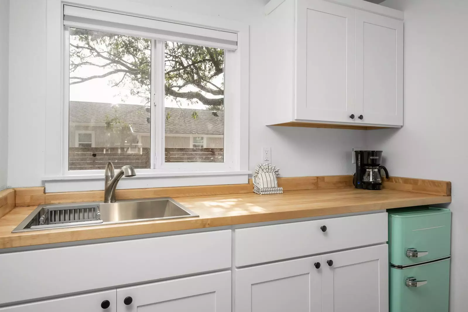 Enjoy a nice meal in the kitchenette area equipped with a mini-fridge, coffee maker, and microwave.