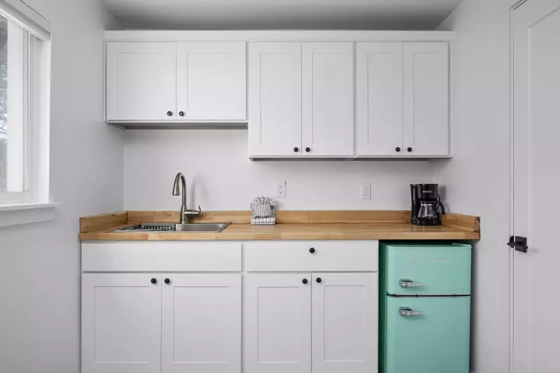 Enjoy a nice meal in the kitchenette area equipped with a mini-fridge, coffee maker, and microwave.