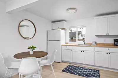 Enjoy a nice meal in the kitchenette area equipped with a mini-fridge, coffee maker, and microwave.