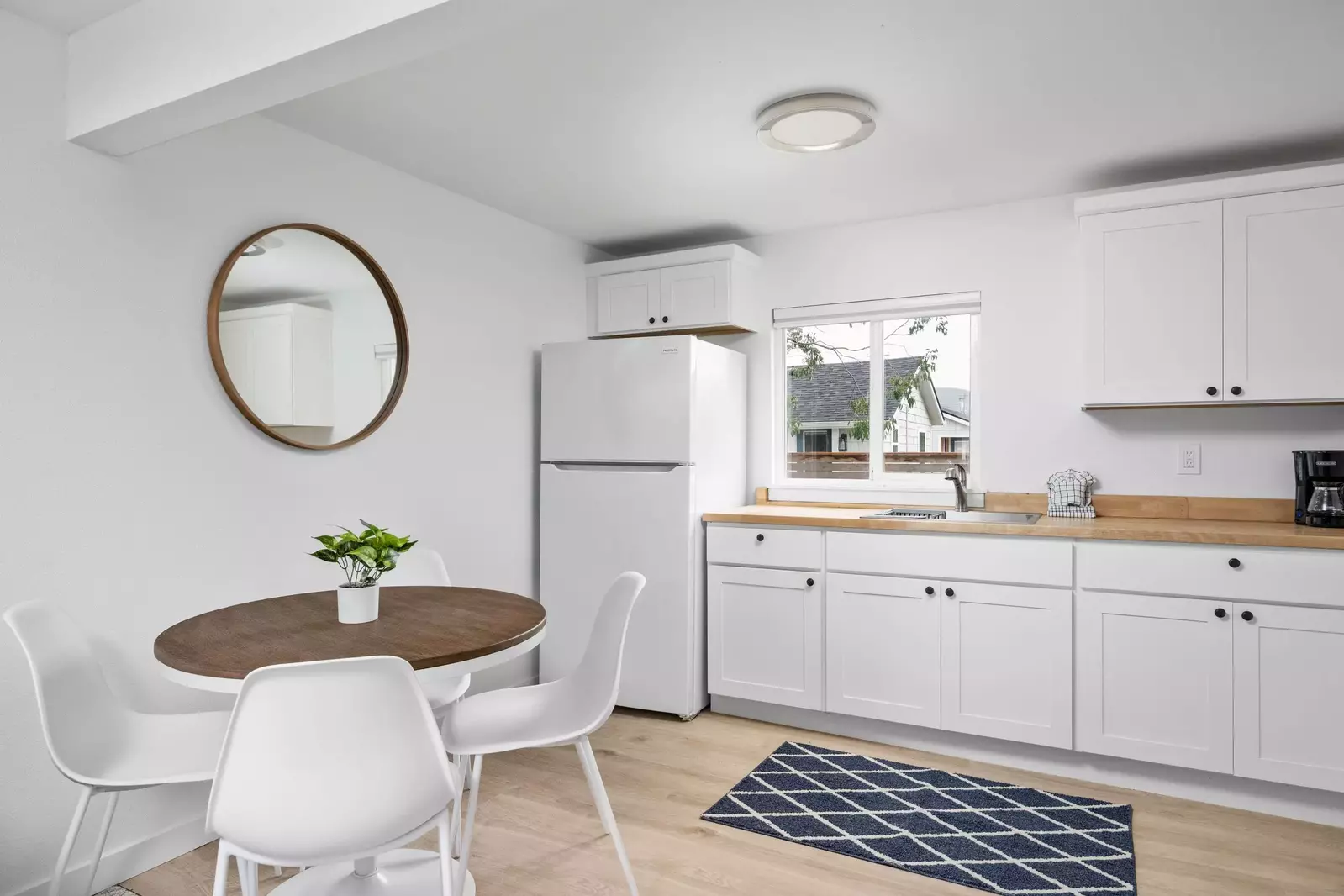 Enjoy a nice meal in the kitchenette area equipped with a mini-fridge, coffee maker, and microwave.