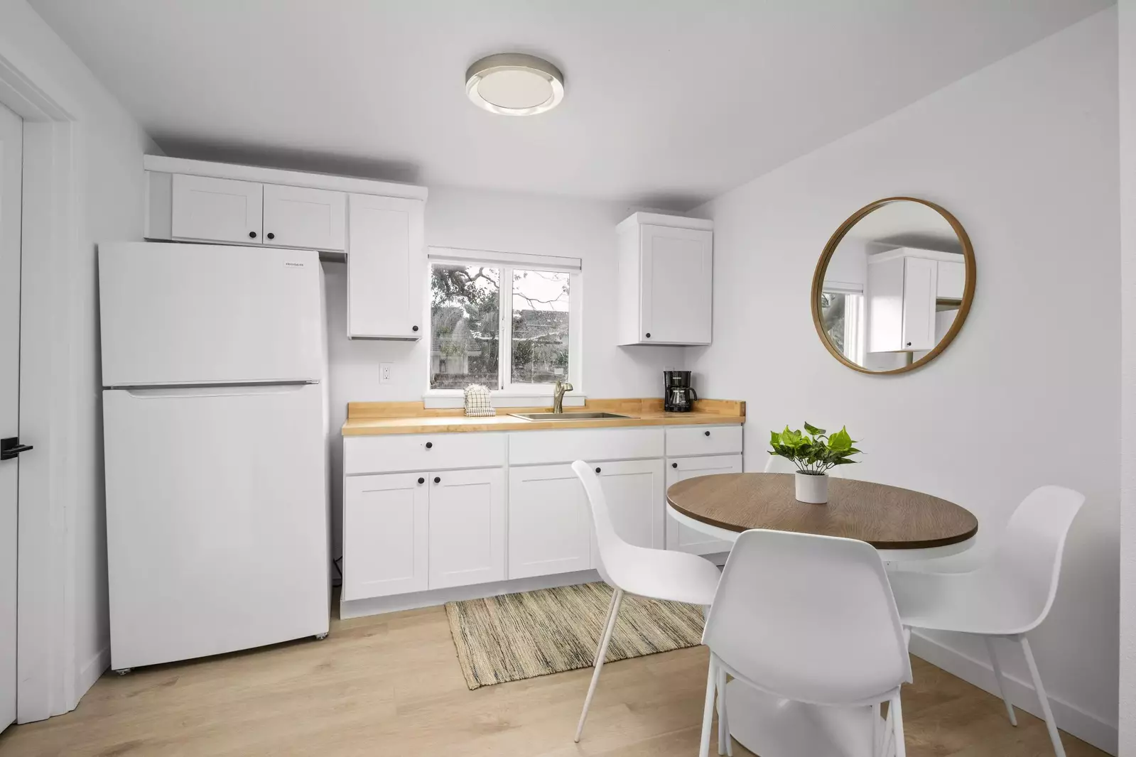 Enjoy a nice meal in the kitchenette area equipped with a mini-fridge, coffee maker, and microwave.