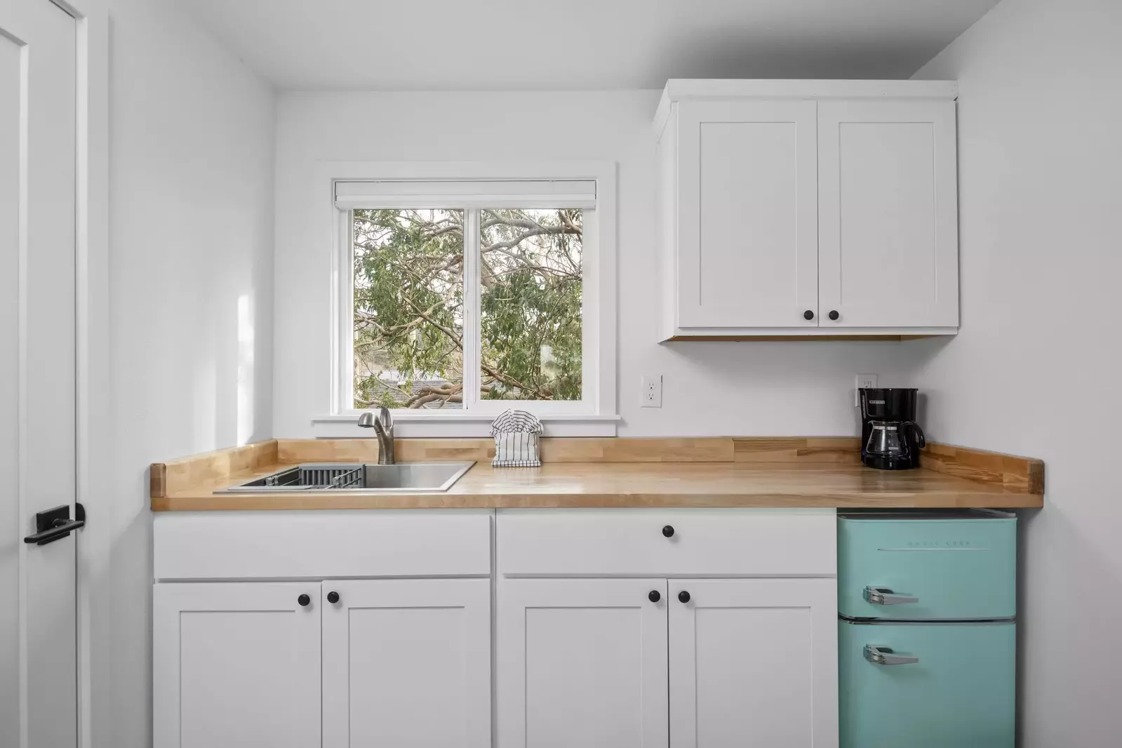 Enjoy a nice meal in the kitchenette area equipped with a mini-fridge, coffee maker, and microwave.