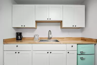 Enjoy a nice meal in the kitchenette area equipped with a mini-fridge, coffee maker, and microwave.