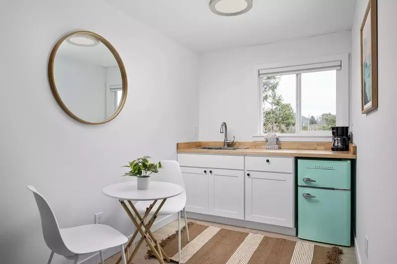 Enjoy a nice meal in the kitchenette area equipped with a mini-fridge, coffee maker, and microwave.