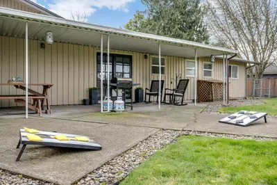 Play a game of corn hole as another member of your group grills on the BBQ.