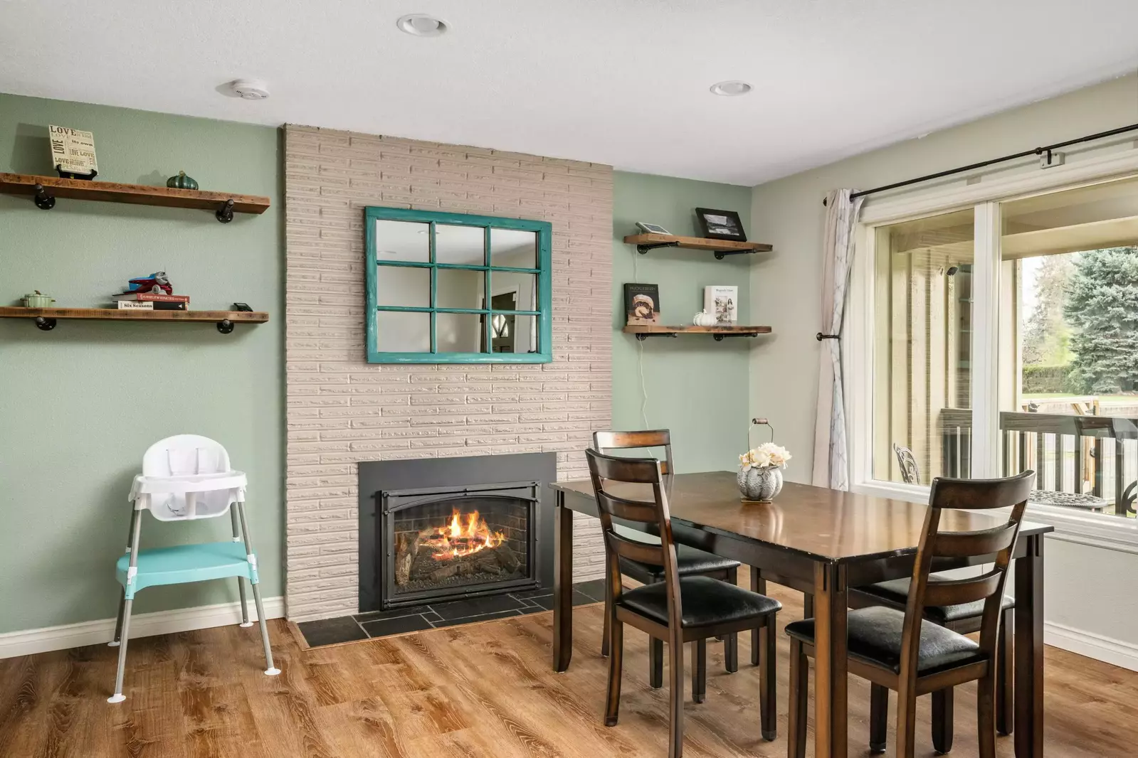 Enjoy a delicious meal while staying cozy at the fireplace.