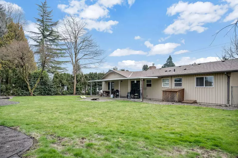 You can grill, play corn hole, play fetch, have a picnic, and have an all around great time in this property's massive yard.