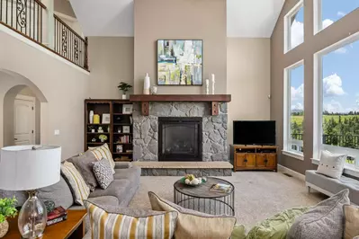 Relax in the living room in front of a cozy fire, while watching your favorite shows, movies, and sports!