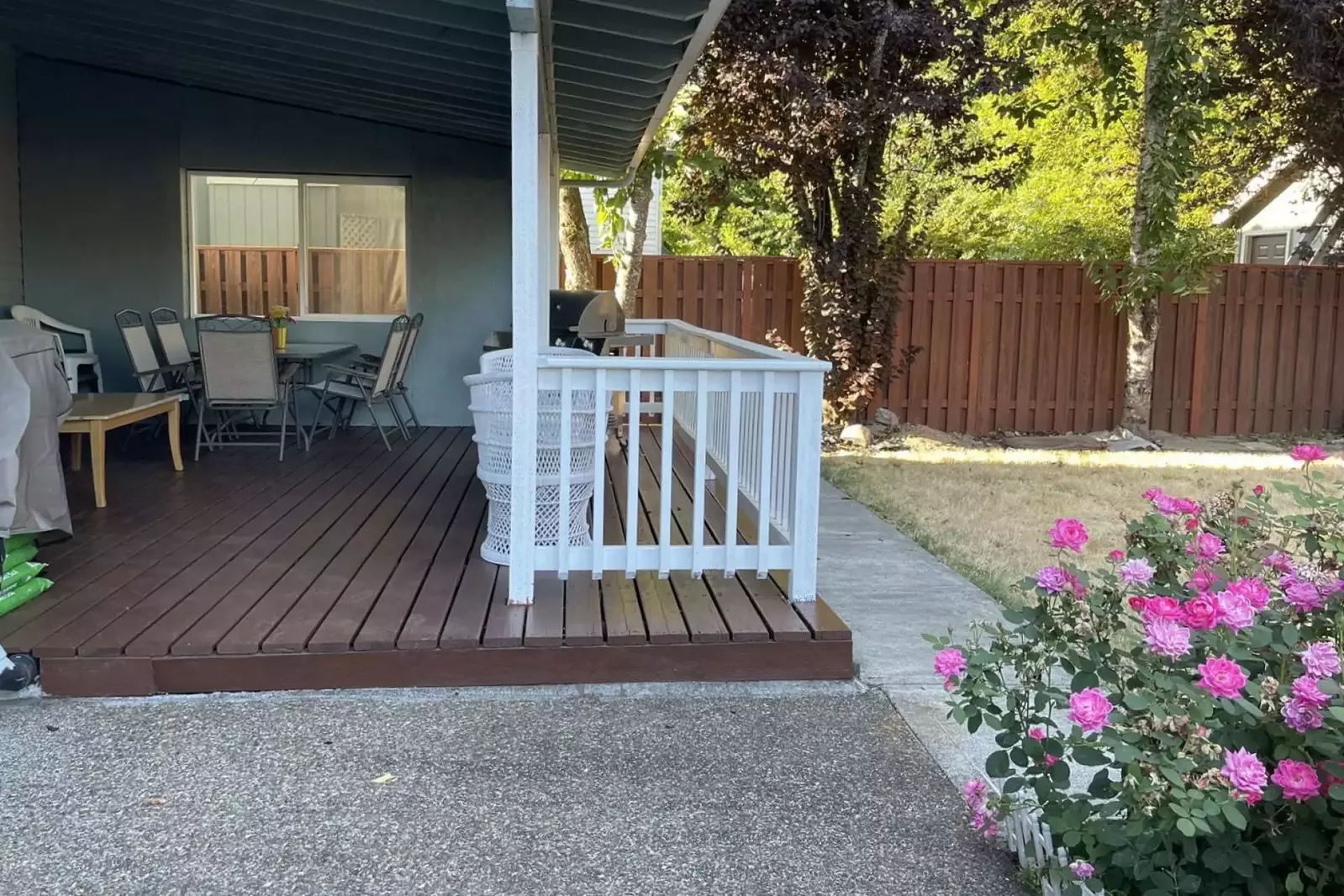 The covered deck is a great place to get some fresh air while staying dry.