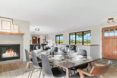 Enjoy a delicious meal while staying cozy near the fireplace.