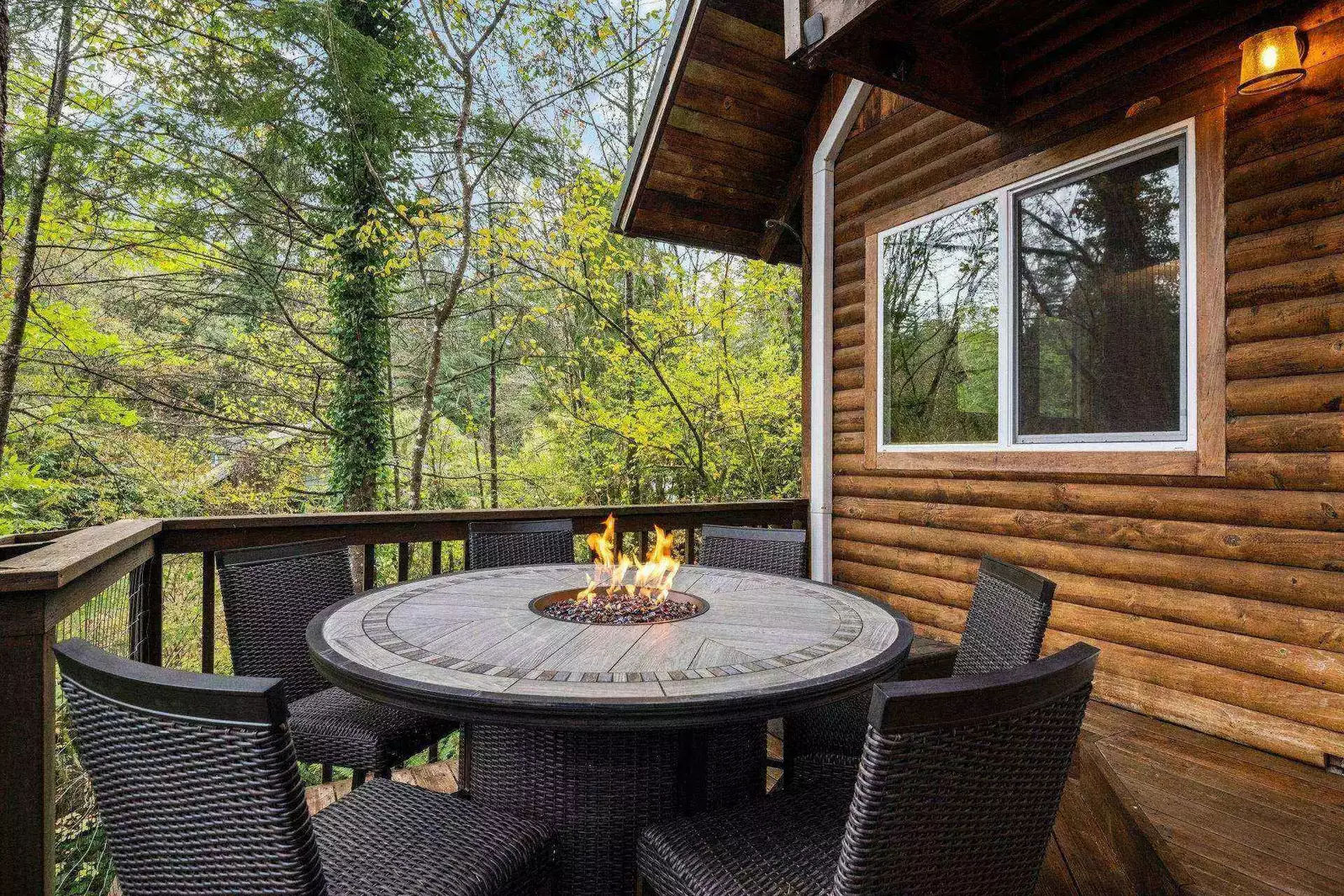 The fire table is another spot to enjoy a lovely forest night.