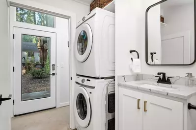 This rental has an up to date washing machine and dryer for guest use.