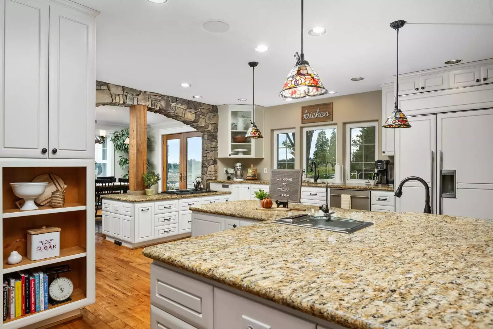 The open layout gourmet kitchen is perfect for your culinary desires. Please note the counters are both average and shorter height.