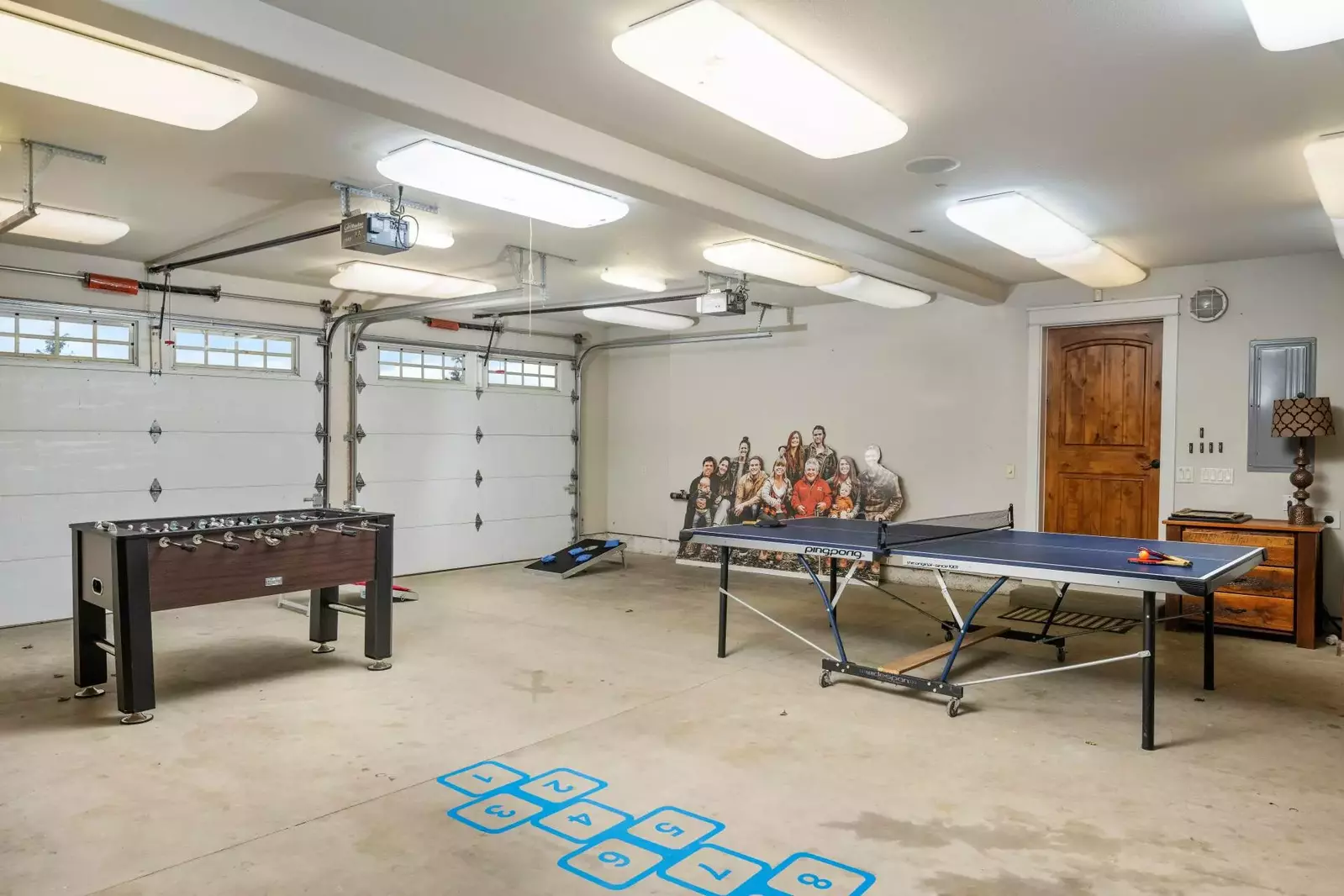 Play a game of cornhole and then jump on the hopscotch.