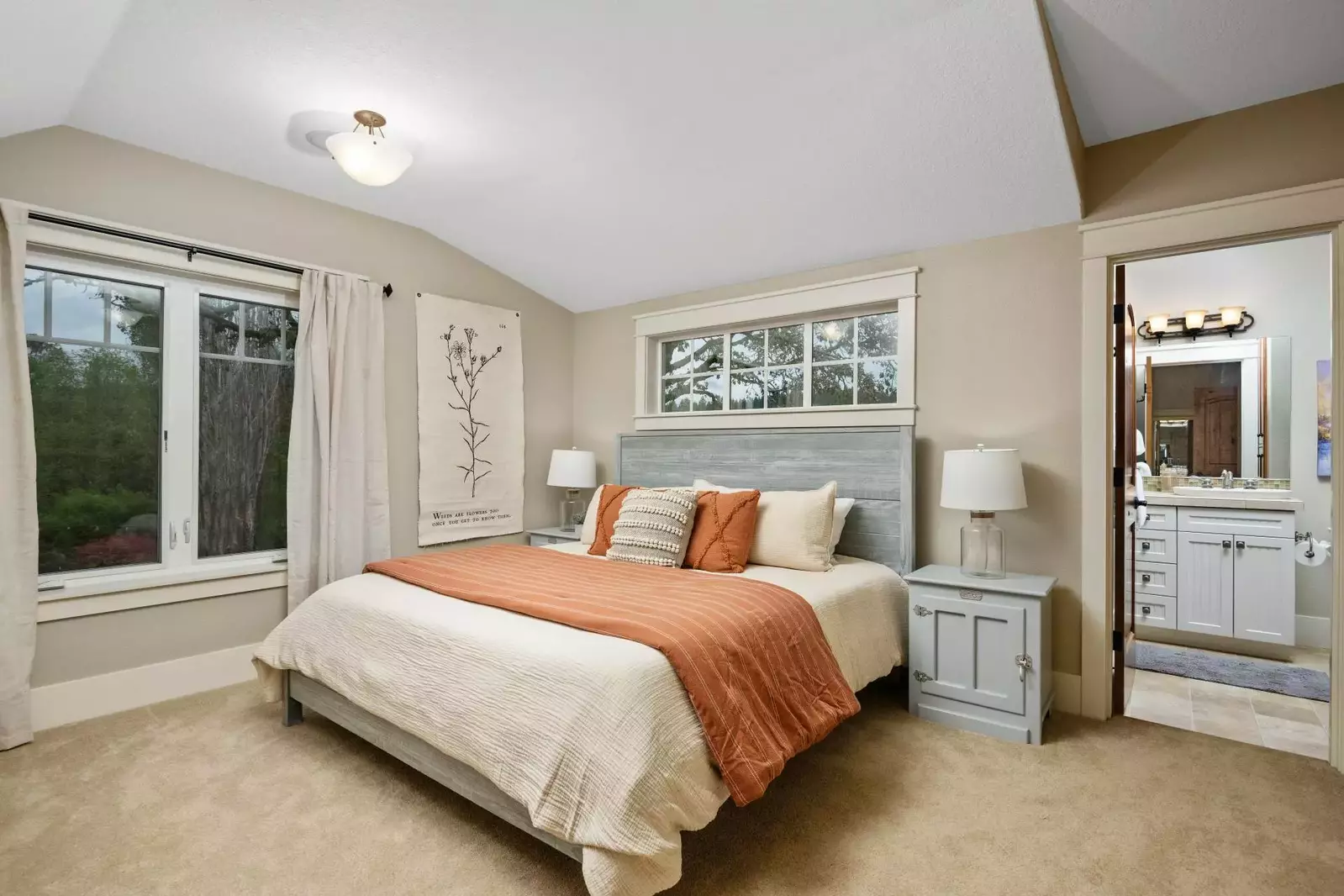 This bedroom features an en suite bathroom.