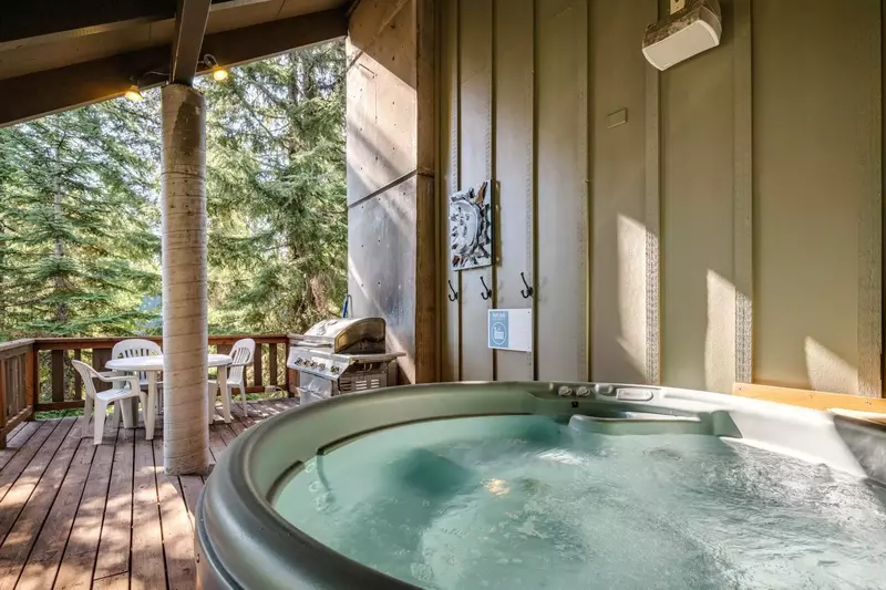The hot tub is a favorite amenity perfect during warm summers and snowy winters.