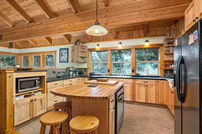 Cook delicious meals for breakfast, lunch, and dinner in this fully equipped kitchen. We suggest grabbing some ingredients from a local farm.