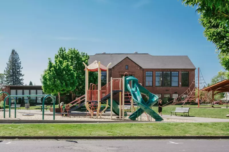 There is a fun playground right across the street.