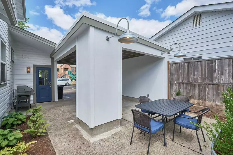 The patio area is a perfect place to grill and relax.