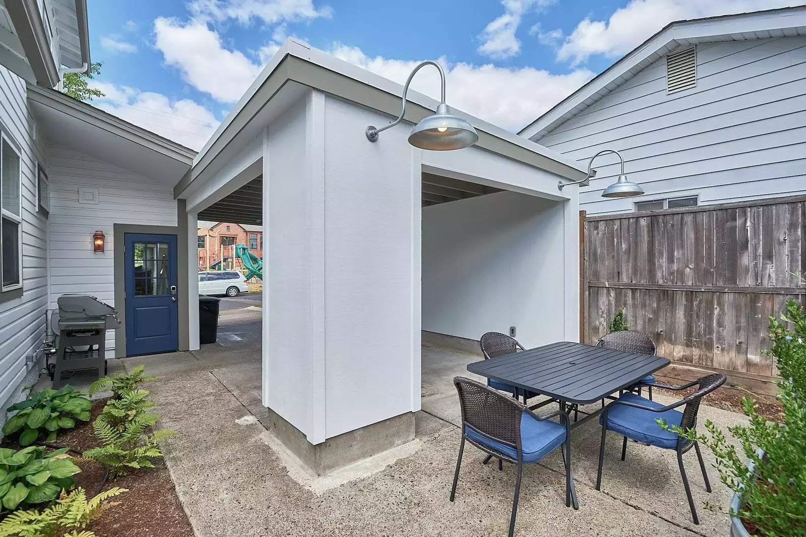 The patio area is a perfect place to grill and relax.