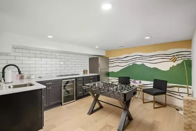 In addition to the kitchen, a large kitchenette and second refrigerator is so appreciated for extra space when preparing and cooking meals for groups.