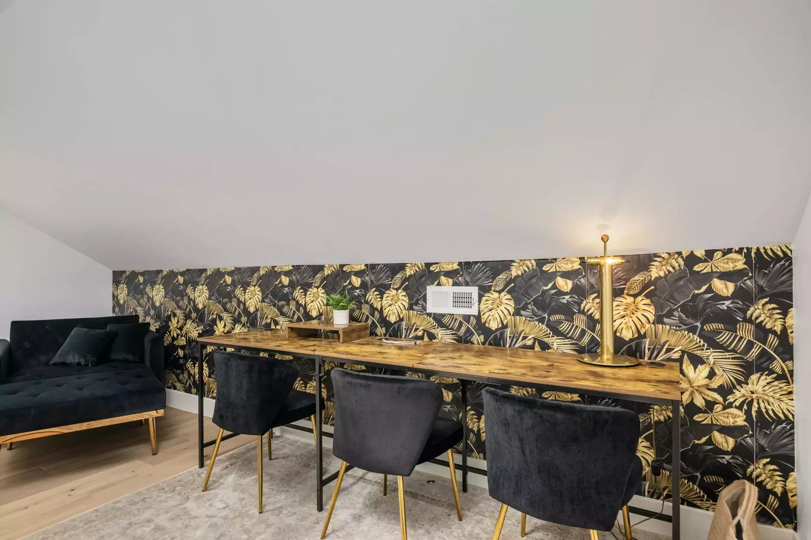 Ascending upstairs you are greeted with an incredible desk and workspace if you need a place to be productive.