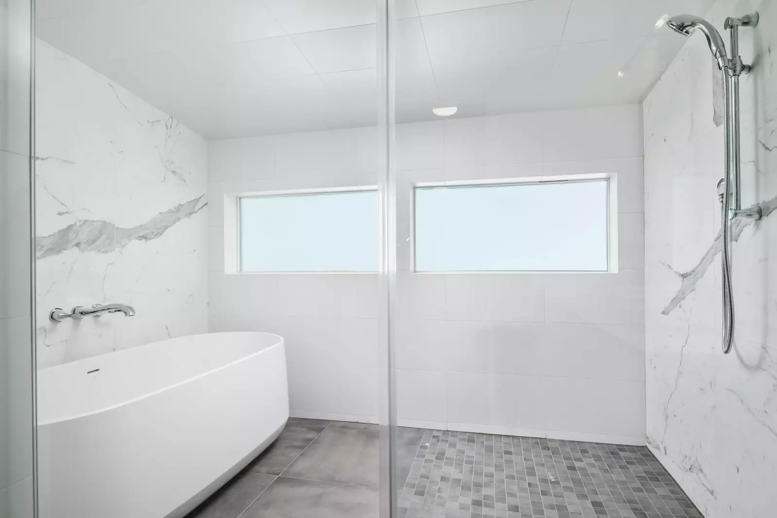 Don't miss the incredible primary bathroom with two sinks, a soaking tub, and an enormous shower that will make every morning start off wonderfully.