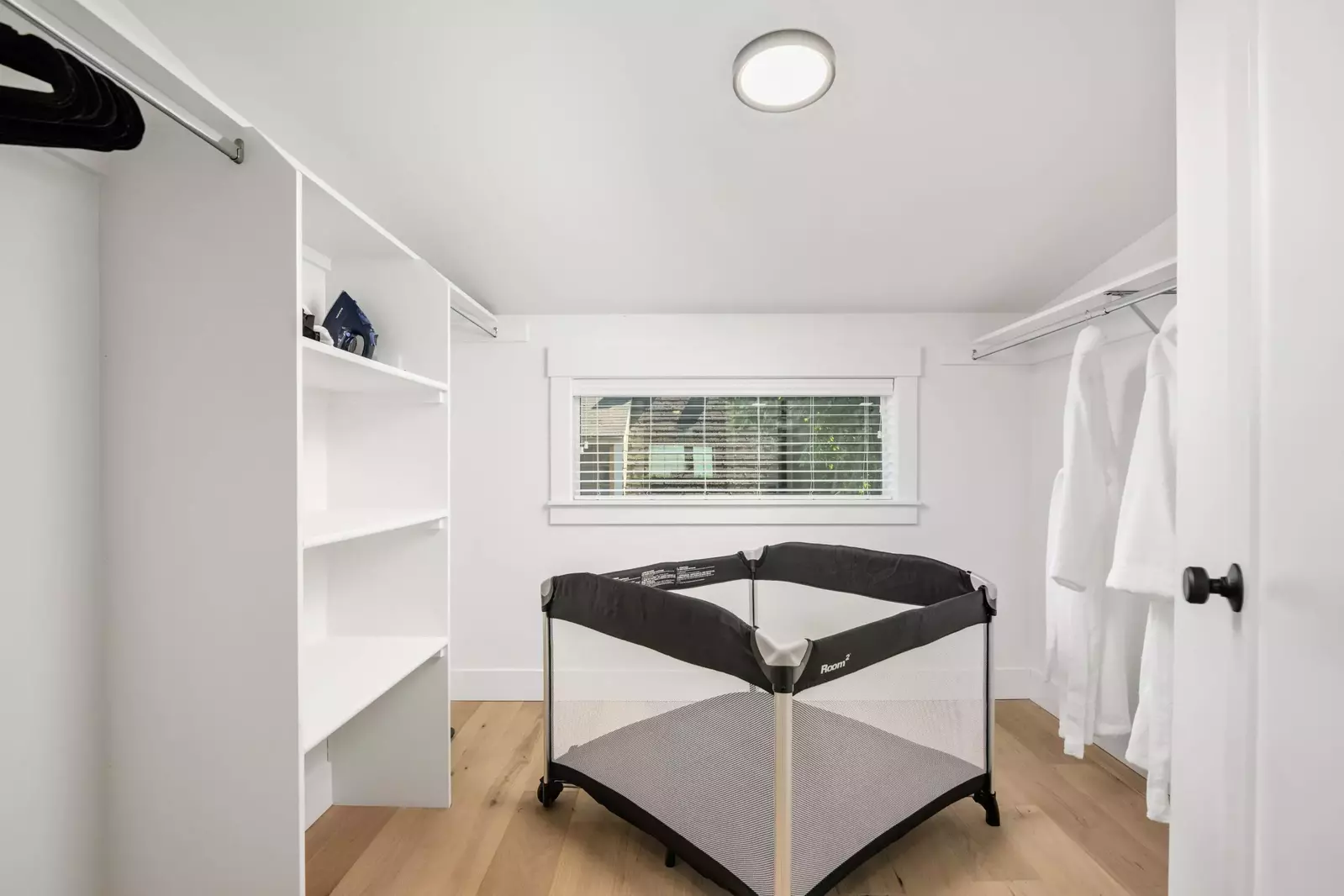 The walk-in closet comes equipped with a pack n play for those traveling with youngsters.