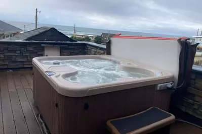 The hot tub is a favorite amenity perfect during warm summers and chilly winters.