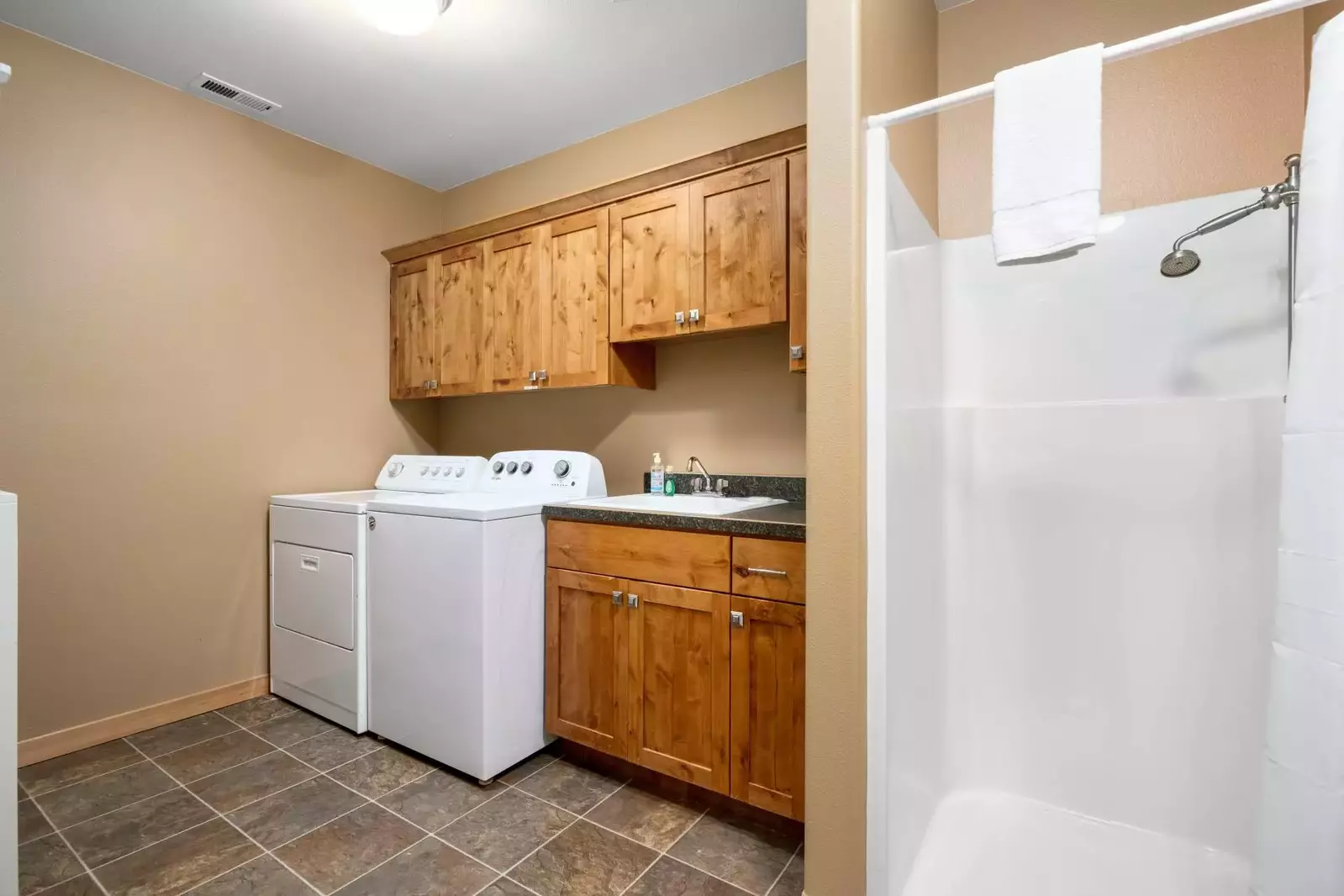 This rental has an up to date washing machine and dryer for guest use.