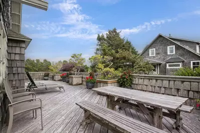 "Wonderful location just a block from beach access. Also close to downtown. Very walkable.  Beautiful deck with views of the ocean." - Thomas