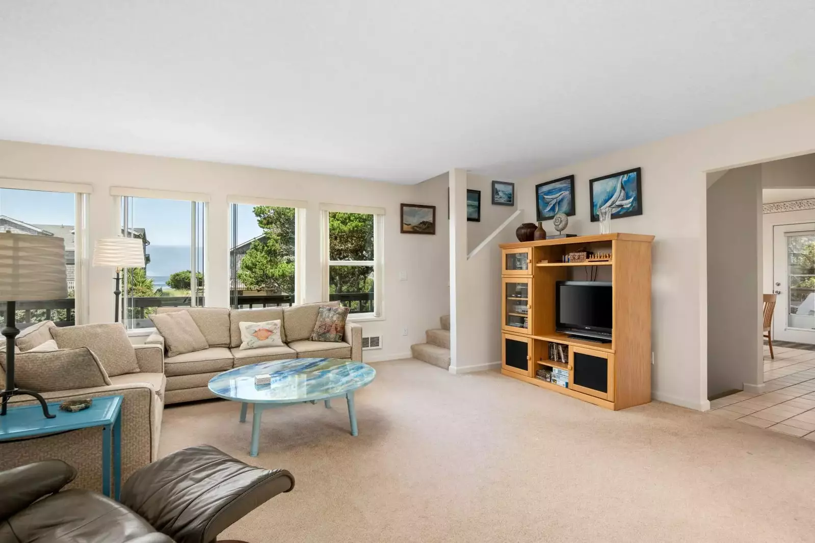 Relax in  this spacious living room and watch your favorite shows, movies, or sports!