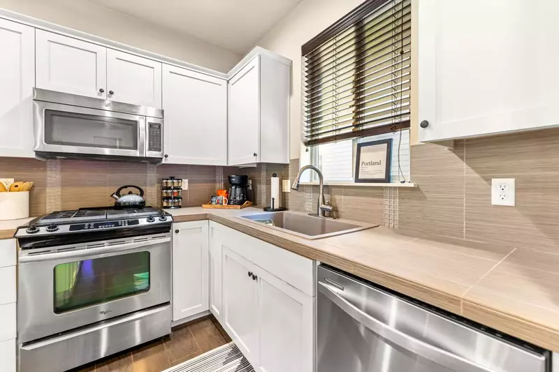 The kitchen has ample counter space and up to date appliances.