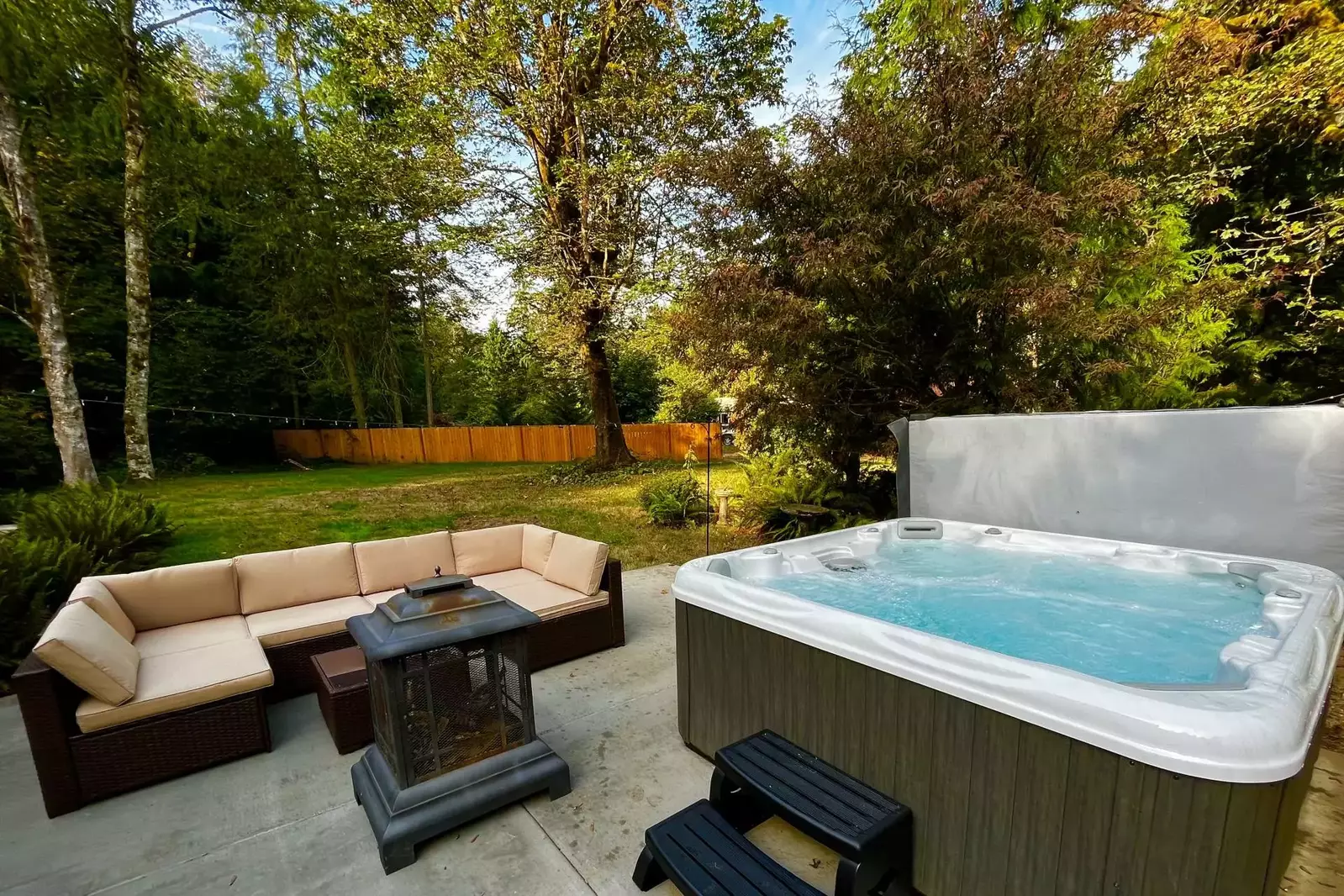 The hot tub is a favorite amenity perfect during warm summers and enchanting winters.