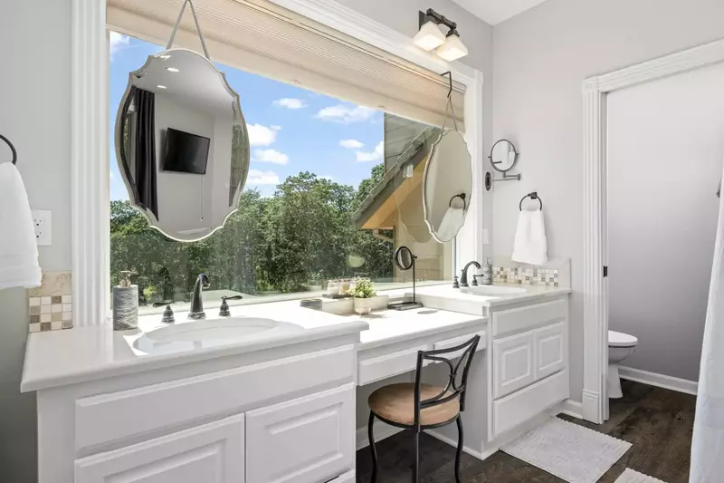 Two spacious sinks and a vanity space.