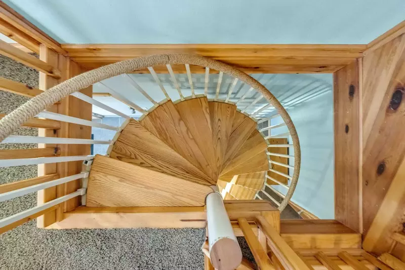 The spiral staircase is another feature that makes this property magical.